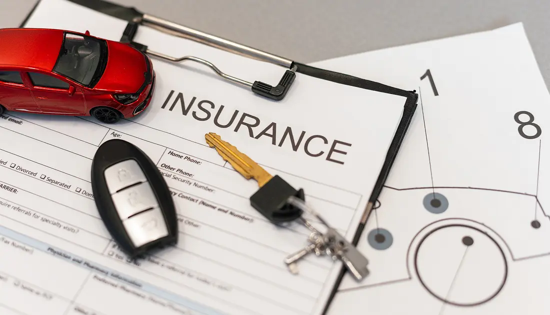 Auto insurance form with car key