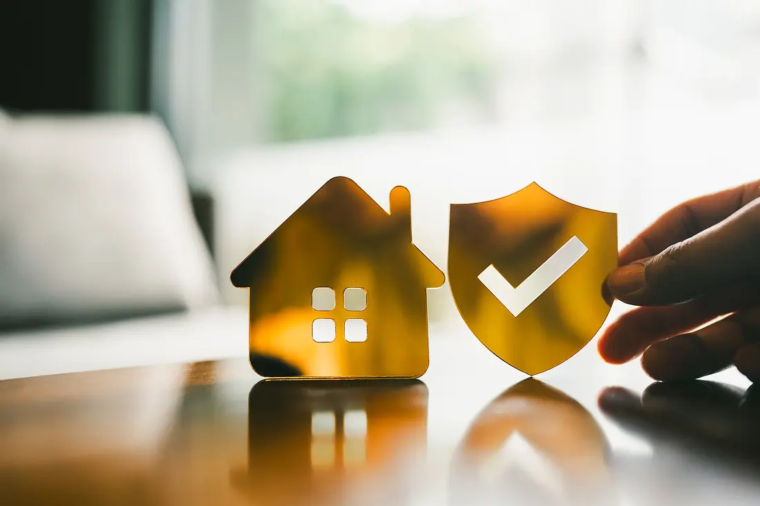 House and shield with checkmark