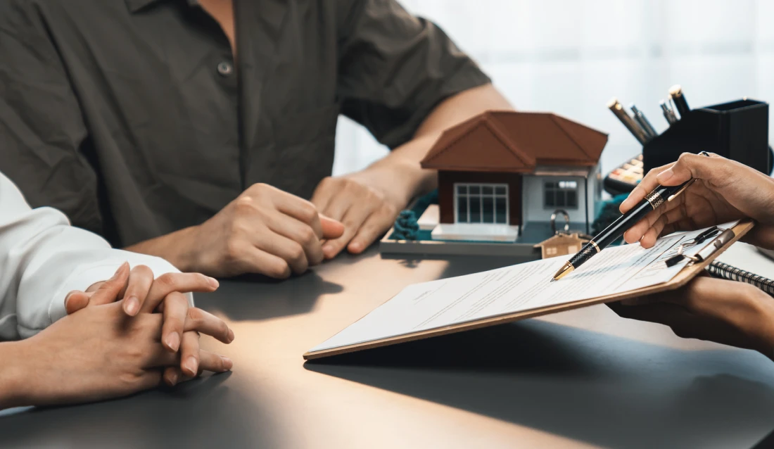 Real estate contract signing meeting