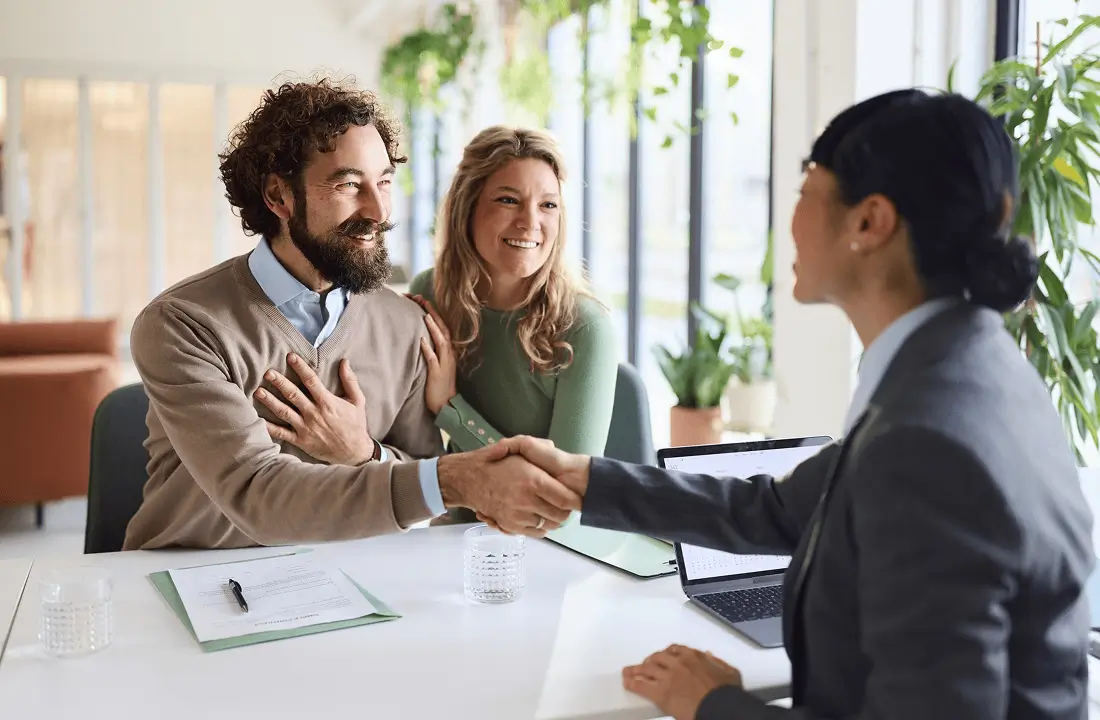Couple meeting with financial advisor.